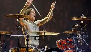 Image for Travis Barker: From Blink-182 Drummer to Pop-Punk Icon